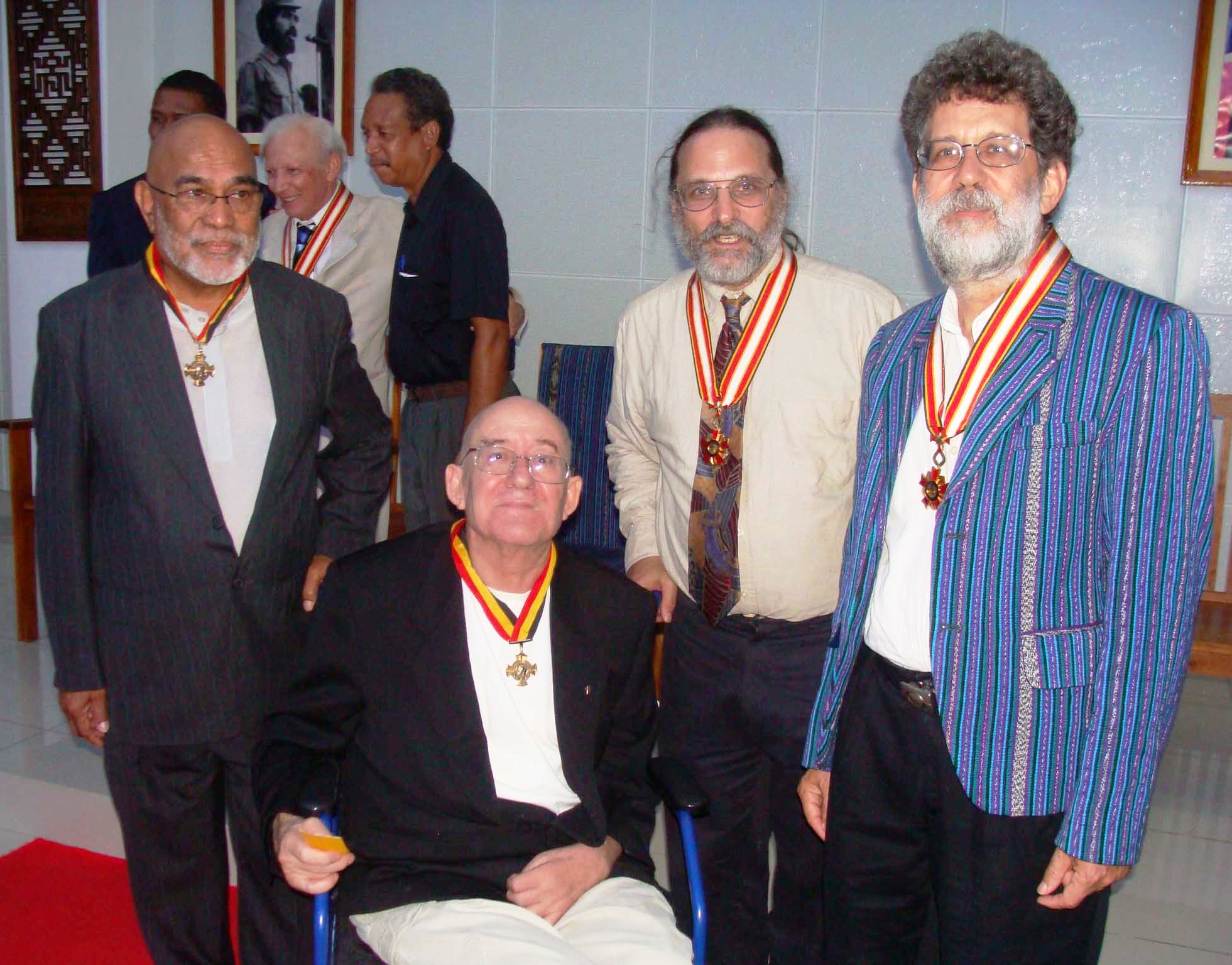 From left:  Father Reinaldo Cardoso, Father Domingos Morato da Cunha, and John M. Miller, and Charles Scheiner