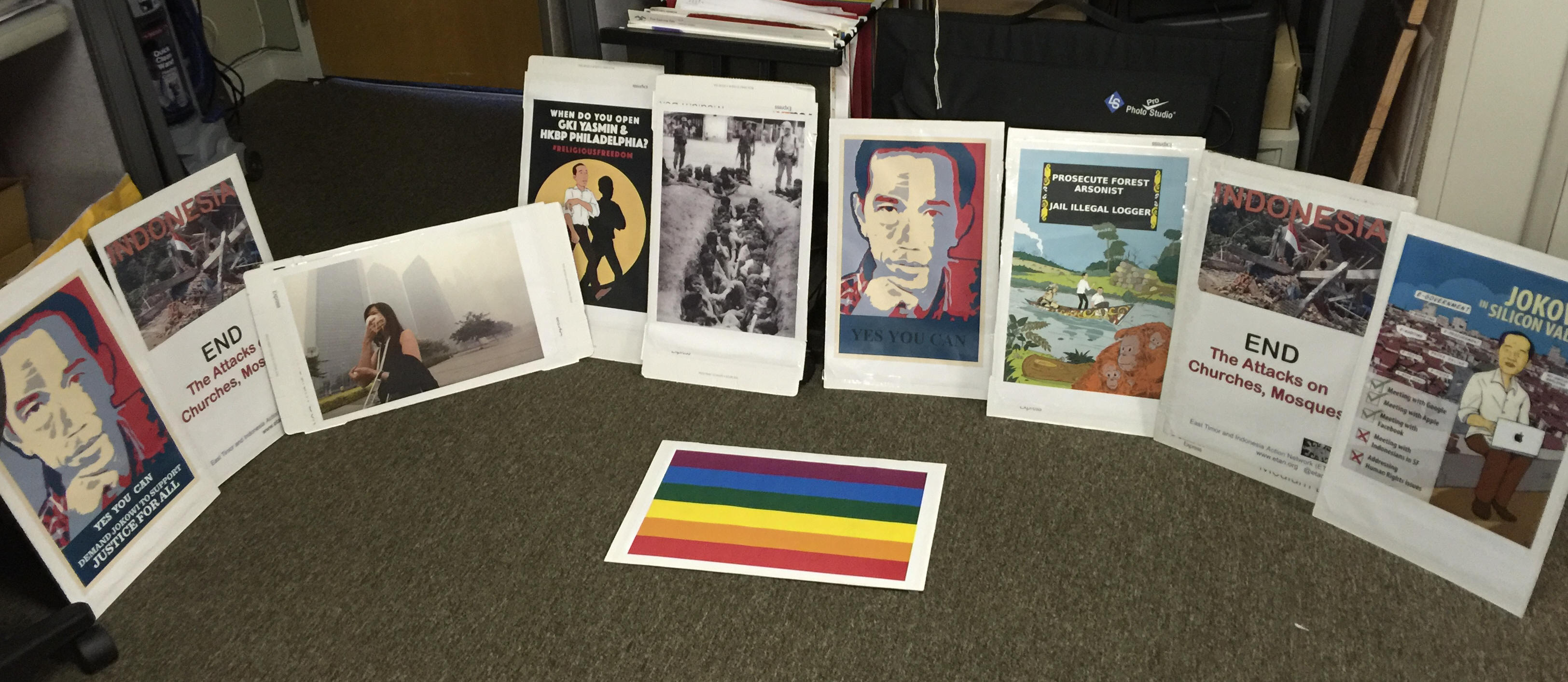 Signs are being readied for October 28 demonstraton.